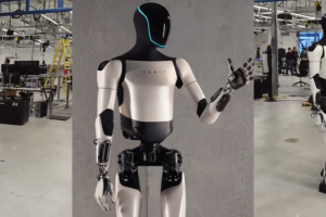 Роботът Оптимус на Илон Мъск се Разходи (ВИДЕО)